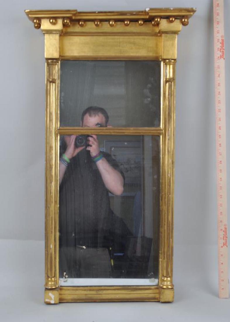 Federal Gilt Tabernacle Mirror: the projecting cornice with spherules, columned frame with two mirror plates. Losses to gilt surface, later plate. 23" high, 16" wide. Provenance: Property of a CT Estate.