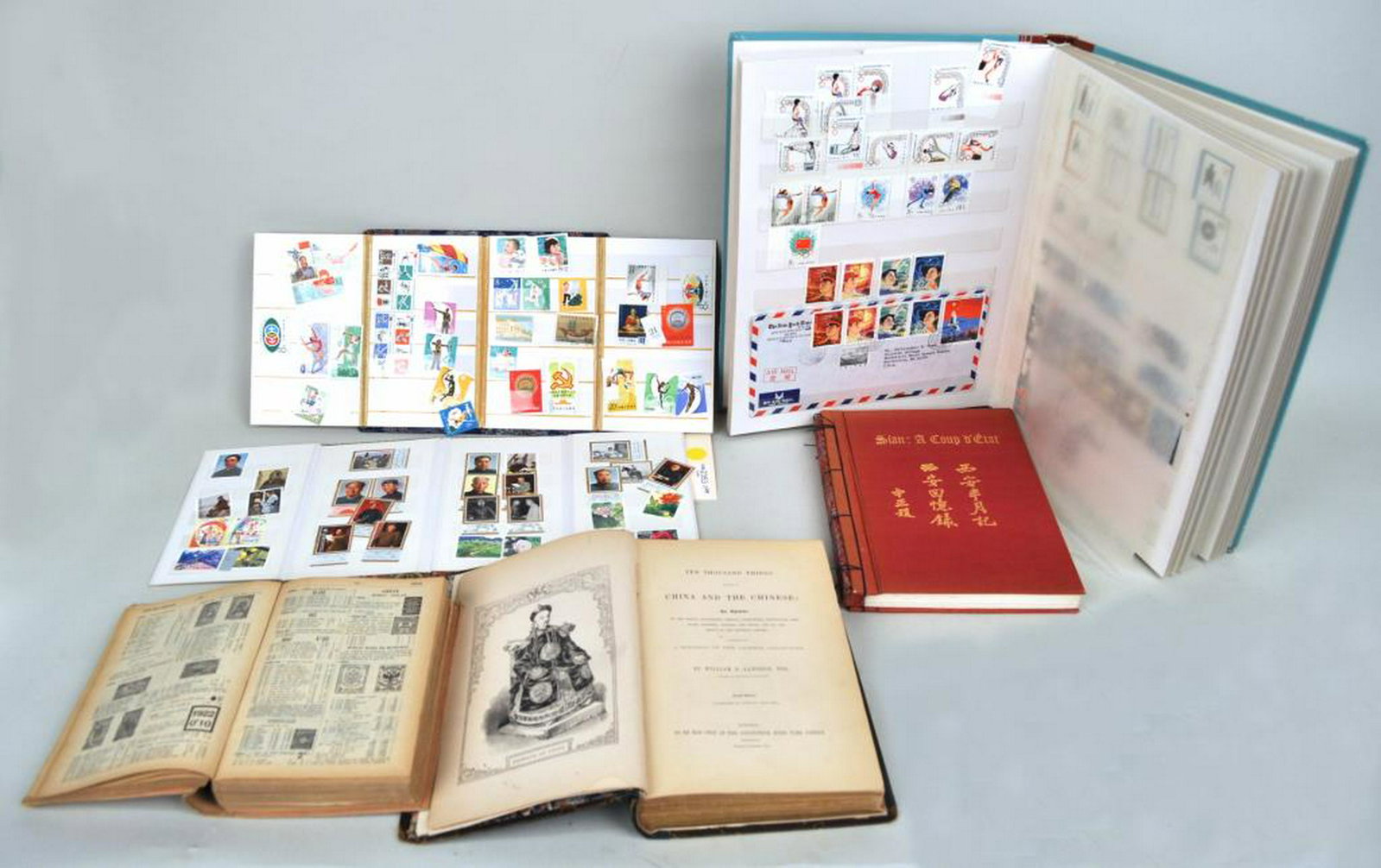 Group Chinese Stamps & Books: Collection Chinese postage stamps in two small and one larger partial albums, together with a 1931 stamp price guide and two books: Langdon, China and the Chinese (1843), 2nd ed. and Madame Chiang Kai