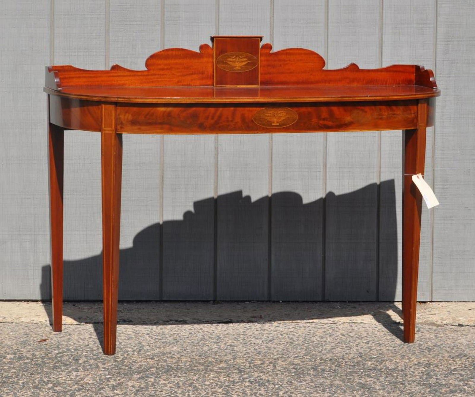 Hepplewhite Inlaid Mahogany "D" Form Server: with raised, shaped back splash with inlaid panel. 39" high, 51 1/2" wide, 22" deep.