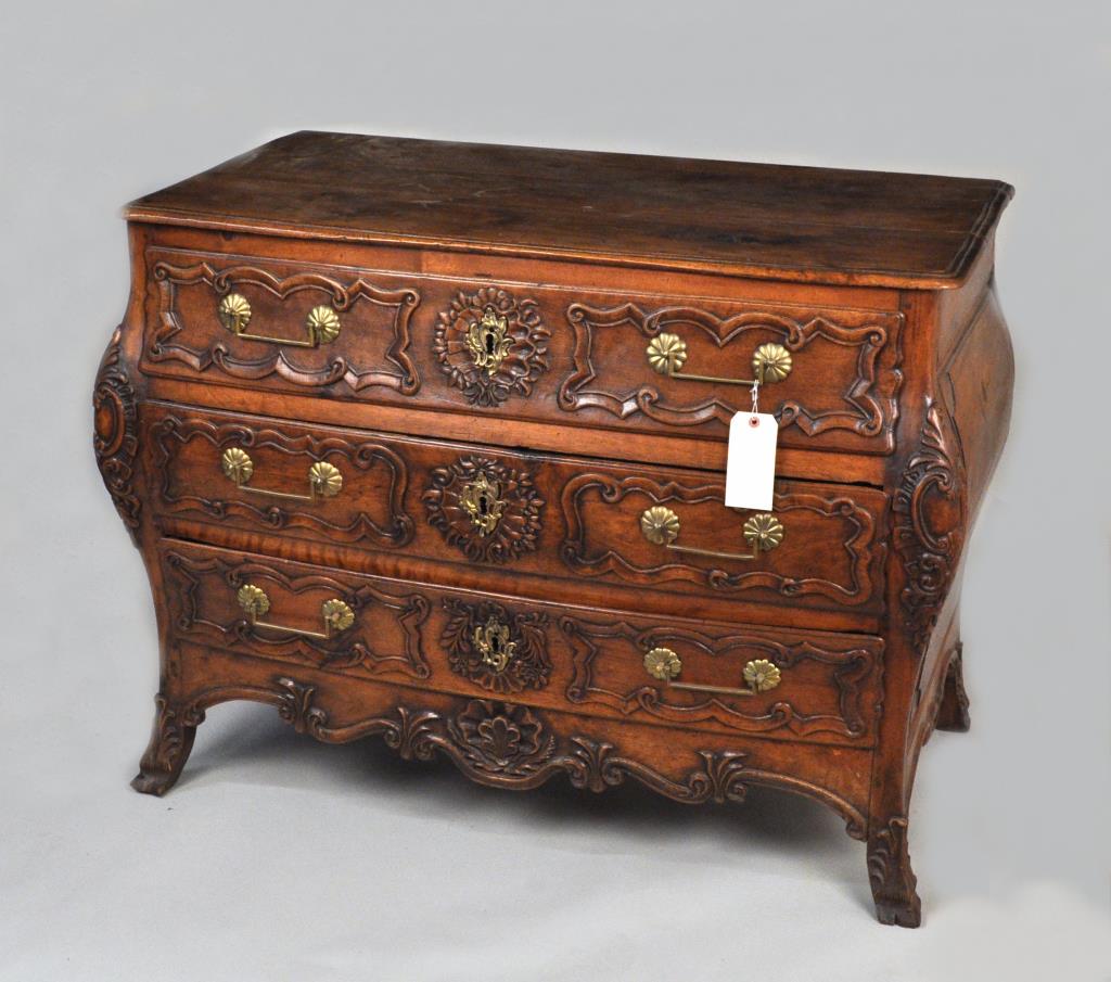 French Carved Walnut Commode: 34 1/2" high, 46 1/4" wide, 26" deep. Finish wear, loss, stains, marring to top, edge nicks, edge losses.