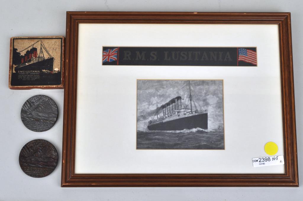 Three Lusitania Commemorative Items: comprising a framed print with sailor's hatband, British commemorative medal in original box, and a second example of the 1915 Bronze Loetz medal. Largest: 10" high, 13" wide. Provenance: Property of