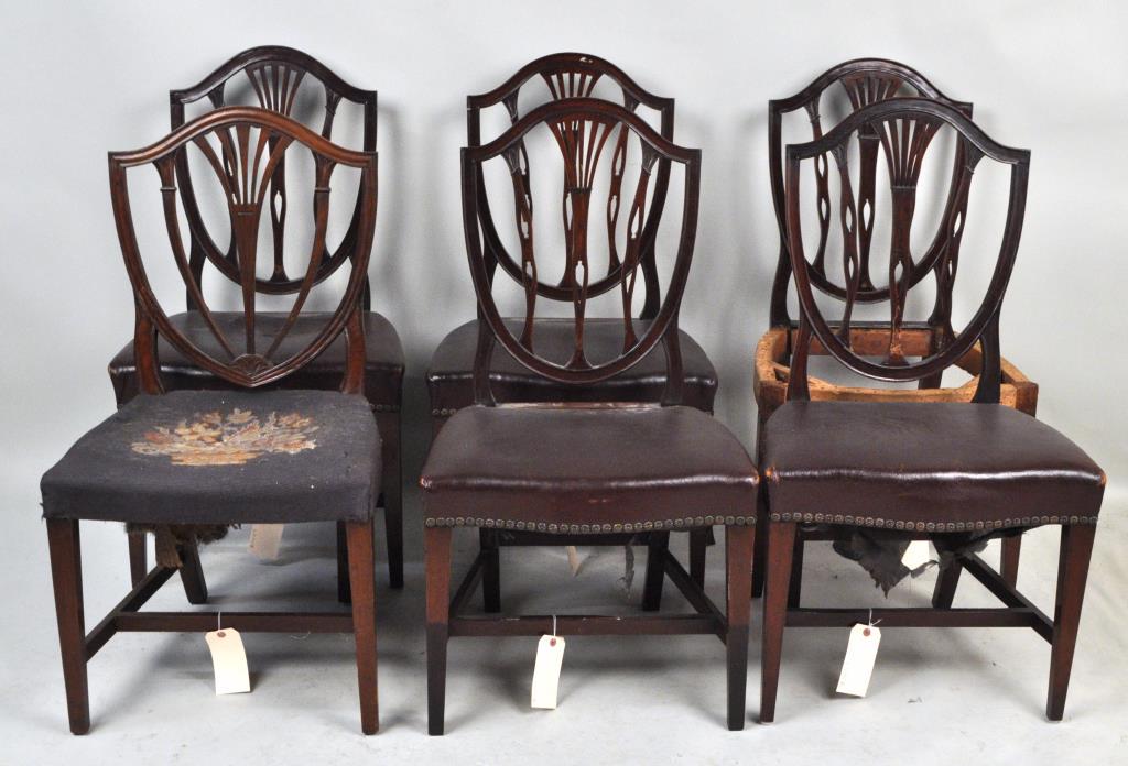Set Six Maryland Hepplewhite Side Dining Chairs: shield back form with incised backs and stretchers. 38 1/2" high, 19" wide, 21" deep. As found condition with one lacking upholstery, some chips and nicks, wear and losses.