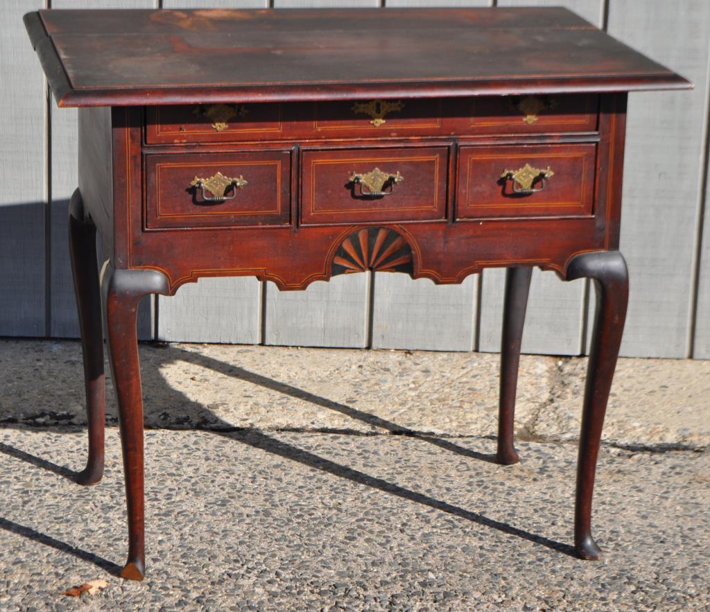 NE Queen Anne Inlaid Shell Lowboy: in as found condition, top detached and in two pieces, needing restoration and sold as is. 30" high, 35" wide, 22" deep.