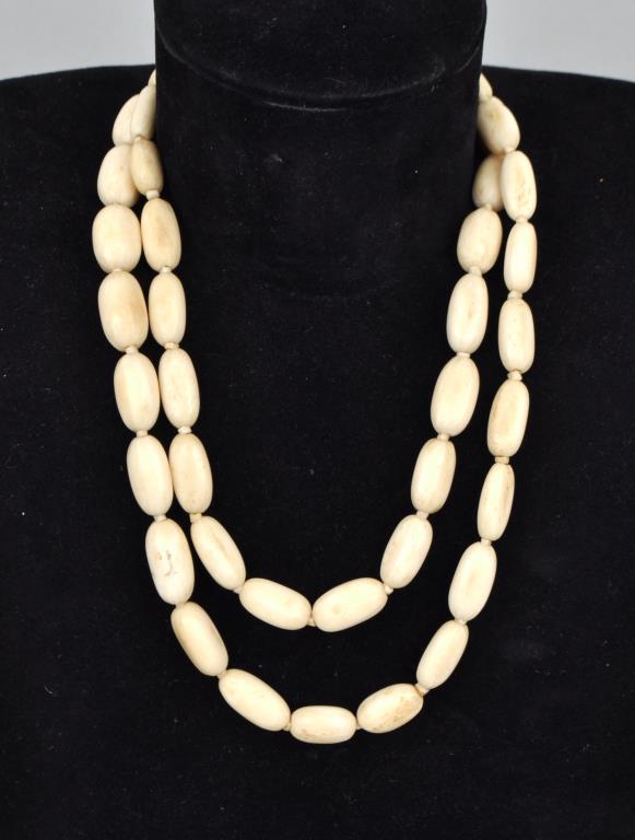 Inuit Walrus Bone Bead Necklace: 1/2" wide, 37" long. Soiling. Provenance: Property of a New Haven County CT Estate.
