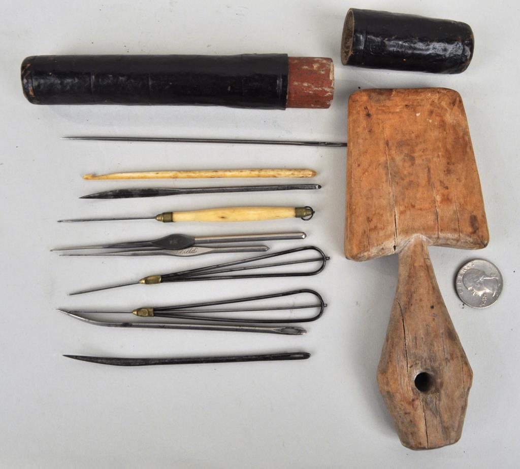 Papier Mache Cased Set of Sailmaker's Tools: comprising ten tools, one engraved "Shield", one "The Star" and a seam rubber. Case: 7" long, 1" diameter. Use wear; small surface losses to case. Provenance: Property of a New Haven County CT Estate.