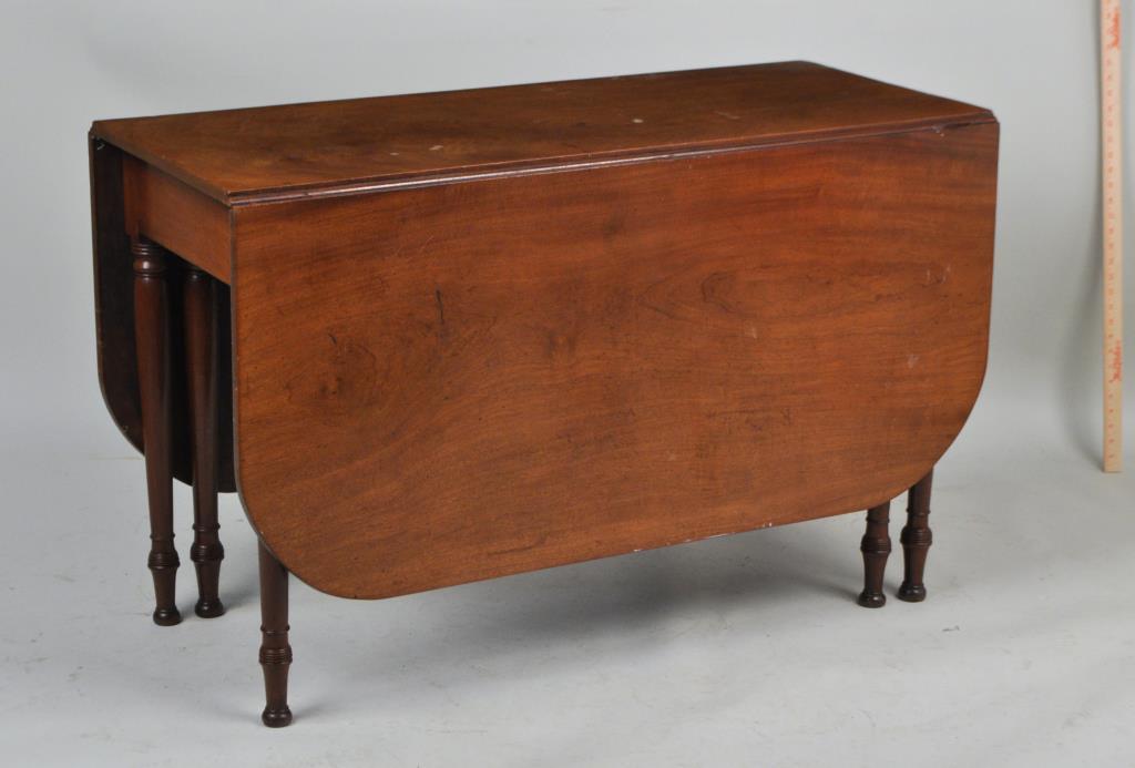 American Sheraton Drop Leaf Dining Table: 28 3/4" high, 45 1/2" wide, 19 1/2" deep, 61" deep (open). A few old stains, scratches, marring to top, finish wear, a few cracks, small loss to hinges.