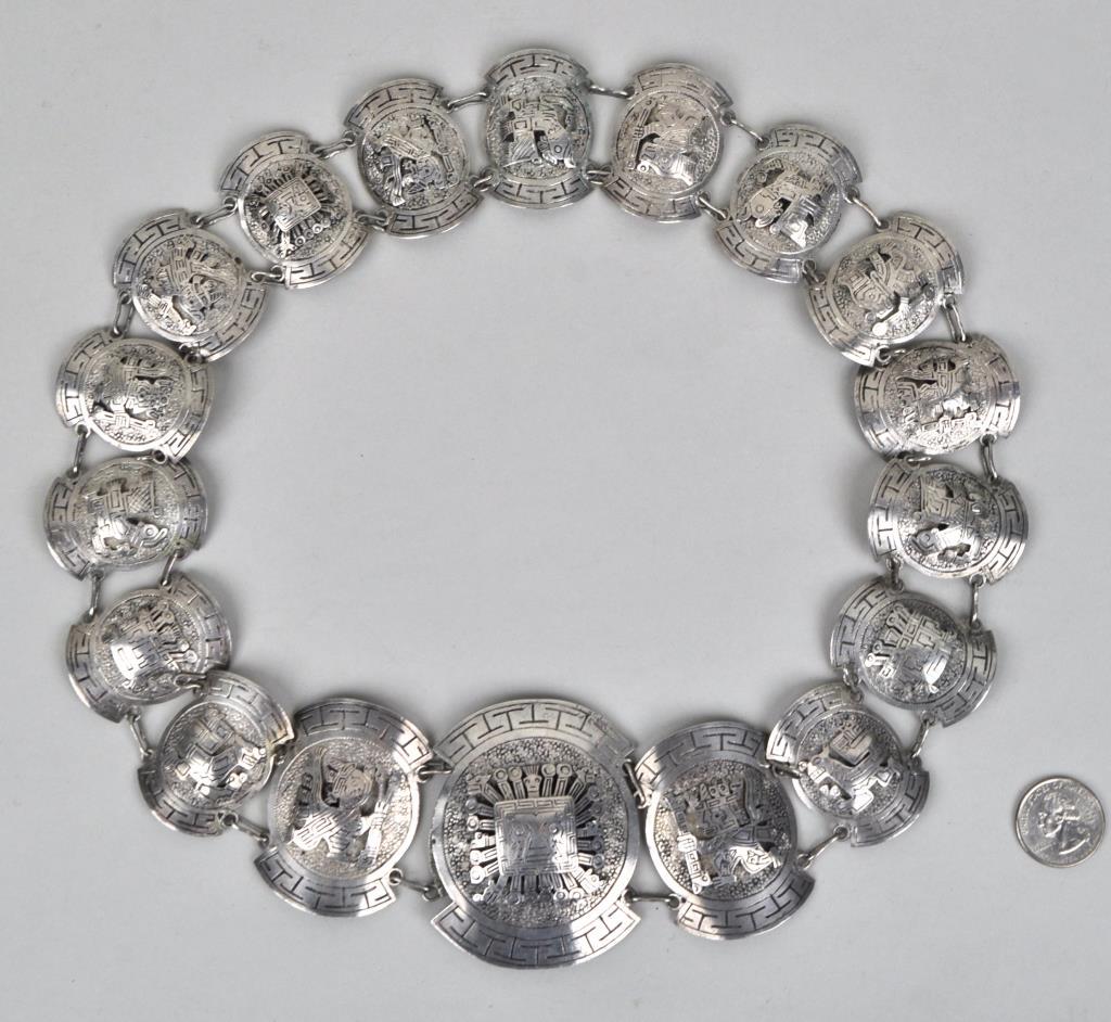Bolivian Silver Link Belt: decorated with ancient style Incan images from Puerta Del Sol, Tiahuanalo. 3 1/4" high, 30" long. Weight: 7.97 OZT. *No credit card payments will be accepted for silver, gold, or jewelry from buyers t