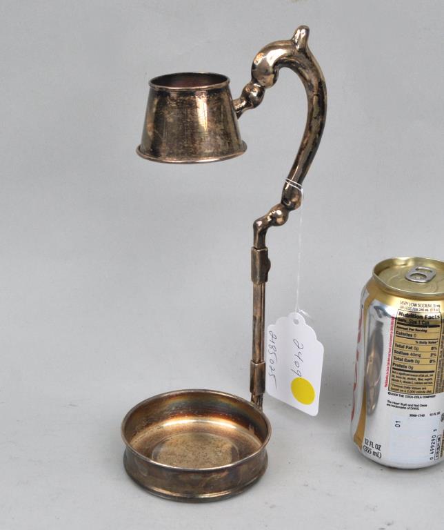 Peruvian Sterling Wine Bottle Holder: 10 1/2" high, 4 1/2" wide to 12 1/2" high. Lacking adjustment knob. Weight: 6.360 OZT. *No credit card payments will be accepted for silver, gold, or jewelry from buyers that have not purchased from o