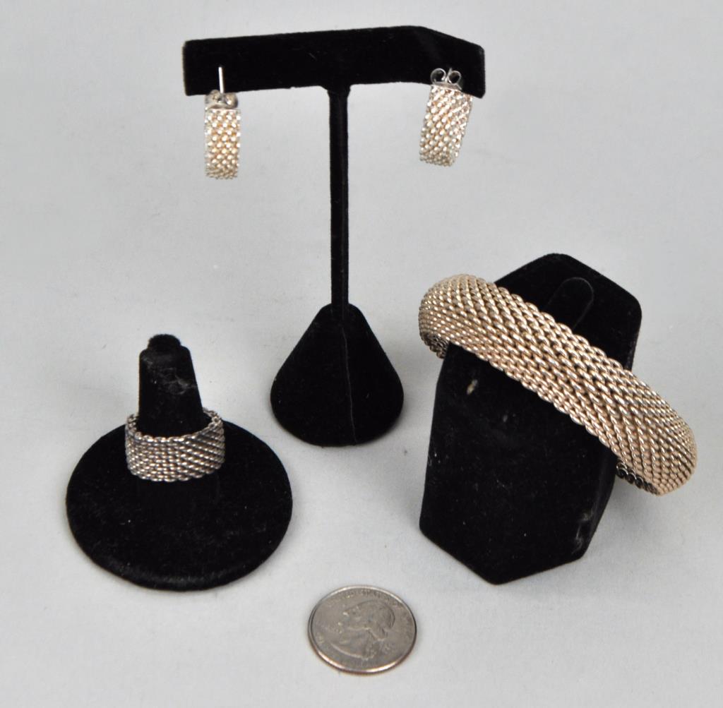 Tiffany Co. Sterling Mesh Bracelet, Ring, Earrings: Largest: 5/8" wide, 2 1/2" diameter. Weight: 2.520 OZT. *No credit card payments will be accepted for silver, gold, or jewelry from buyers that have not purchased from our gallery in the past.