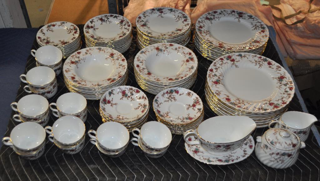 Extensive Minton Porcelain Service: in the "Ancestral" pattern. Comprising 20 dinner plates, 16 salad plates, 12 dessert/pie plates, 11 bread and butter plates, 17 soup bowls, 1 creamer, 1 sugar, 1 gravy boat and underplate, 16 large te