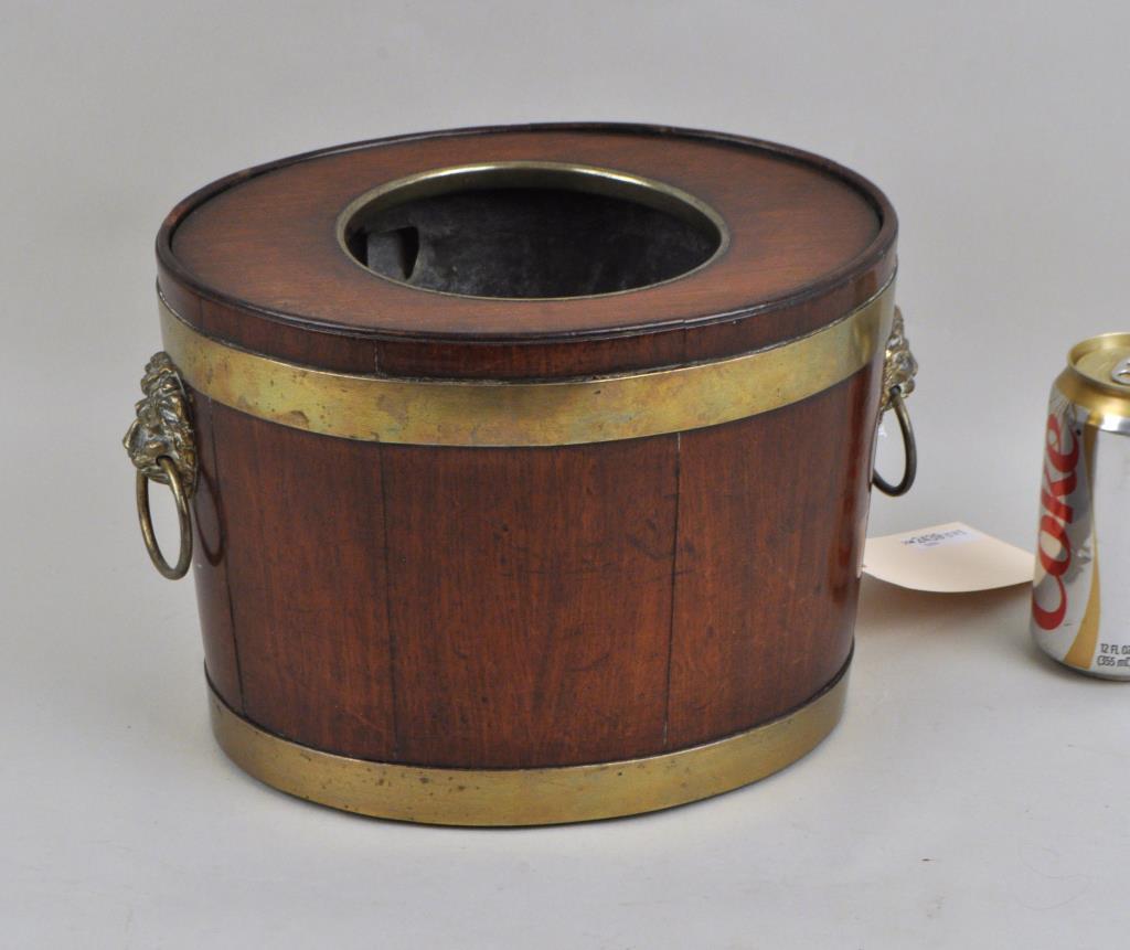 George III Brass Bound Mahogany Wine Cooler: for a single bottle, early 18th c., in two parts. 7 3/4" high, 12" wide, 8" deep. Use wear. Property of a Fairfield County CT Collector.