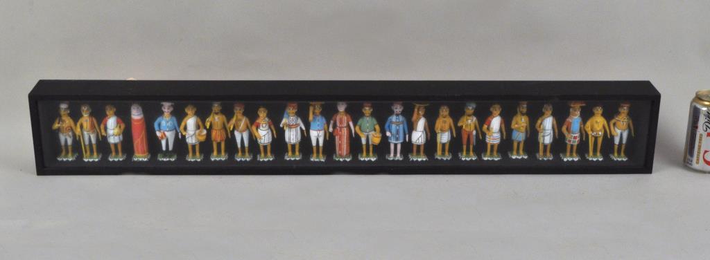 Indian Folk Art Figural Diorama: comprising a collection of 23 hand painted diverse villagers in a shadowbox frame. Frame size: 5 1/2" high, 37 1/2" wide, 2 3/4" deep.