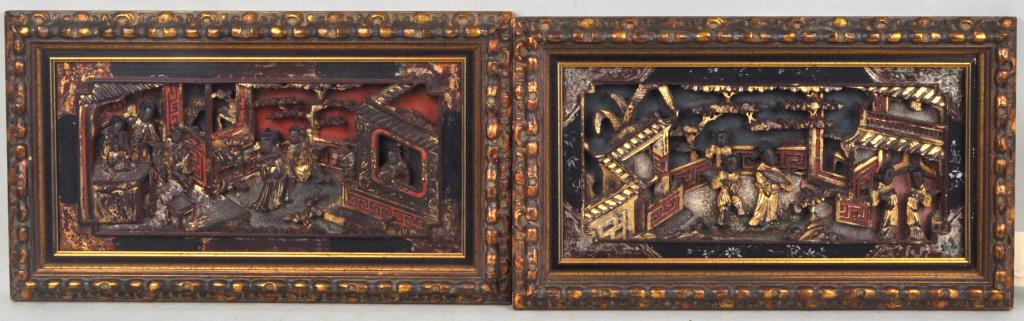 Pair Chinese Carved and Gilt Panels: figures in garden pavilions carved in high relief, one with inlaid inner molding 12 1/2" high, 21 1/2" wide. Provenance: Estate of Lucy Jarvis, NYC.