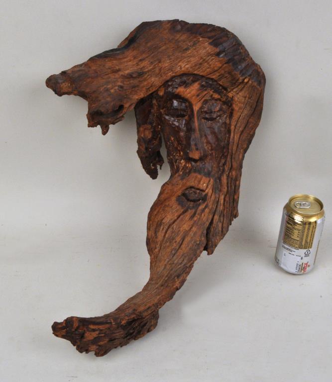Haitian Carved Driftwood Sculpture: of bearded elder. 12 1/2" wide, 19" long. Provenance: Estate of Lucy Jarvis, NYC.