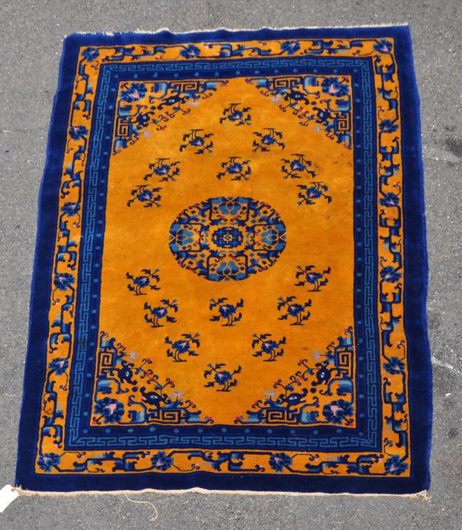 Vibrant Blue/Gold Chinese Art Deco Rug: 8' 2" long, 5' wide. Spots of stains, wear. All rugs sold "as is." Provenance: Estate of Lucy Jarvis, NYC.