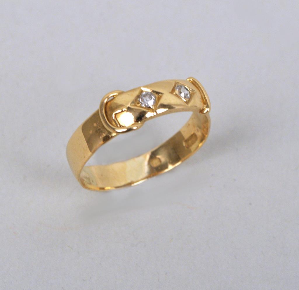 Edwardian 14K Gold & Diamond Buckle Form Ring: containing two diamonds hallmarked in interior "JMF" and a crown mark. Approximate size 10-11. 1/4" high, 1" diameter. Gross weight: 5 grams. Provenance: Property of a Litchfield County Collector. *No