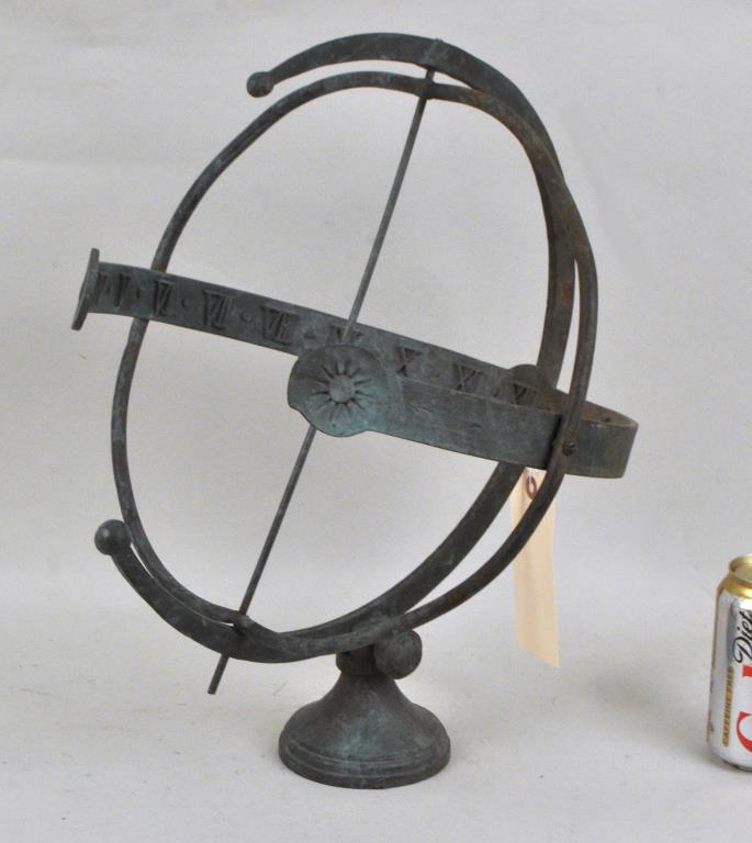 Bronze Armillary Sundial: with rosette decoration on outside band, raised Roman numerals inside. 17 1/4" high, 14 1/8" wide. Oxidation from exposure to the elements.