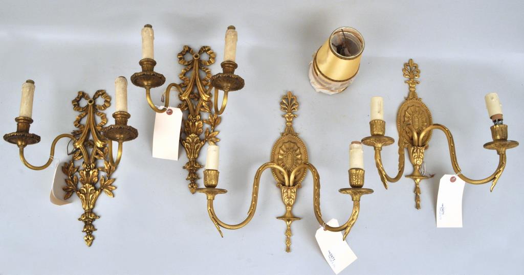 Two Pair Brass 2-Light Wall Sconces: one pair Adam style, one pair with ribbon form backs. Ribbon backs: 14 1/2" high, 10" wide. Adam style: 10" high, 6" wide. Provenance: Property of a Westchester County Collector.