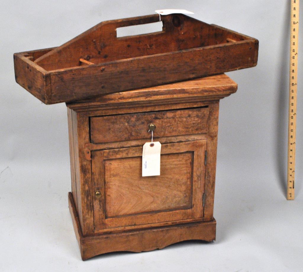 Small Rustic Wood One Drawer Cabinet, Tool Caddy: the largest: 23 1/4" high, 21" wide, 13 1/4" deep. Stains, cabinet with age cracks, finish wear, loss, repairs, wobbly base; caddy with stains, wear, small losses. Provenance: Shagbark Farm, Guest Cot