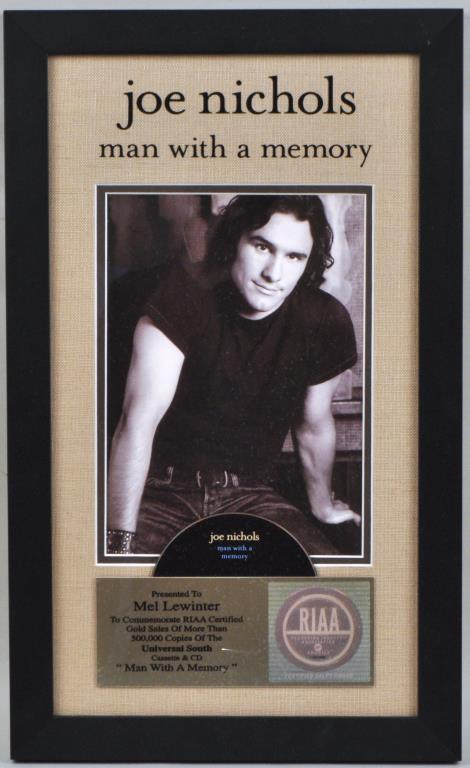 Joe Nichols RIAA Gold Sales Award: presented for " Man with a Memory" cassette and cd. Not examined out of frame. 20 1/4" high, 12 1/4" wide. Provenance: Shagbark Farm, Party Barn, Washington CT.