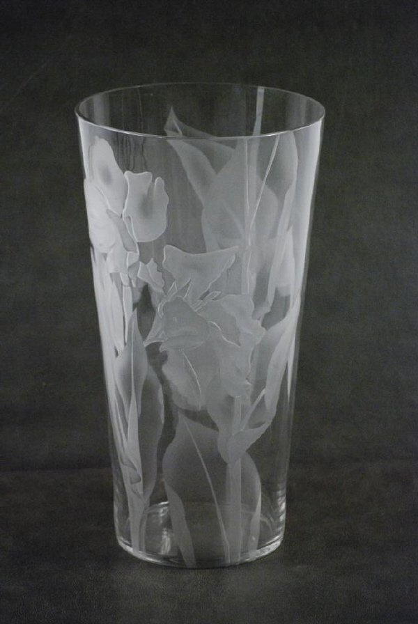 Dorothy Titord signed Cut Back Vase: Dorothy Titord signed cut back vase. Tall vase decorated with iris. Dorothy Titord was a decorator who worked with Lalique. Acid etched monogram on base. Minor scratching. 14" high, 7 1/2" diam.