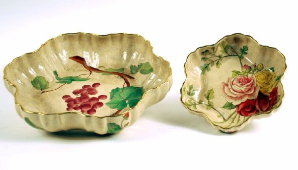 Two Minton's Fruit and Nut Bowls: Two Minton's small bowls with early mark, with grape and rose decoration and gold tracery. The smaller bowl has a tiny rim chip. Craqueleur evident. Small 6 1/2" diameter, 1 1/2" high, Large 10" wide,