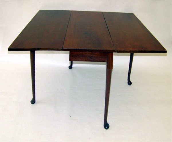 Queen Anne Drop Leaf Dining Table, 18th C.: Queen Anne mahogany drop leaf dining table, rectangular top with straight legs ending in pad feet. England or possibly South Carolina, 18th century. Bears inscription "E.S. Evendon 509 W. 121 NYC"." 3