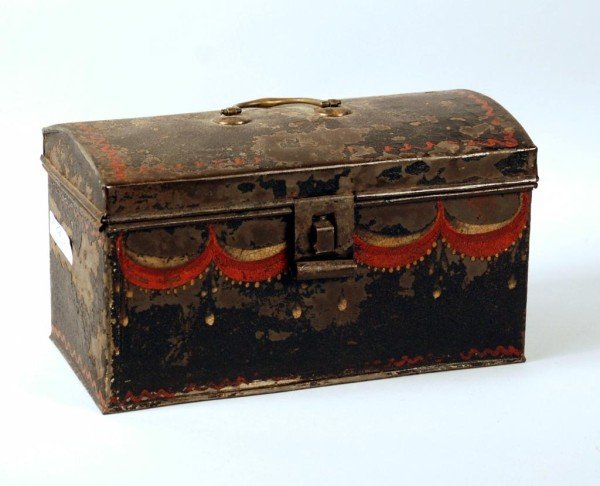 Tole Miniature Chest: Tole box in the form of a miniature dome top chest, 19th century. Losses and wear consistent with age. 5 1/2" high, 9" wide, 4 1/2" deep. Provenance: A California private collector.