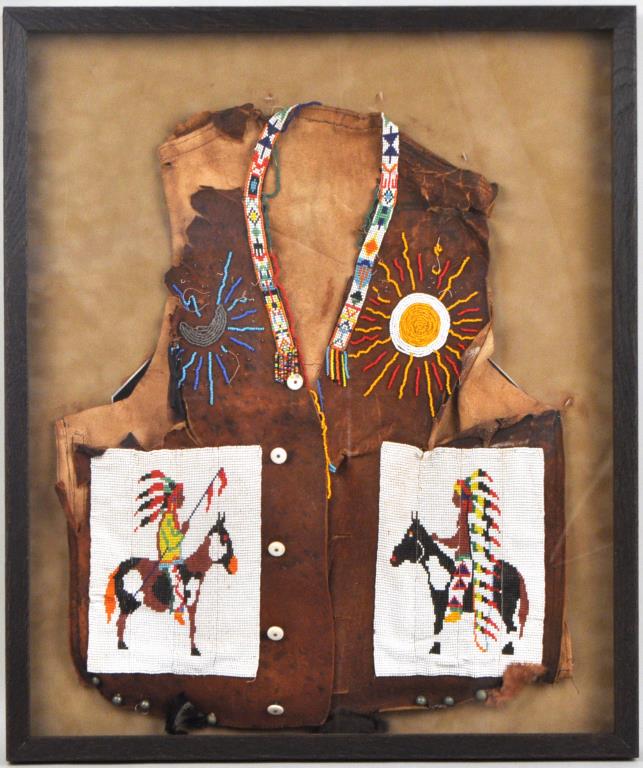 Native American Loom Beaded Hide Vest: framed, not examined out of frame. Frame: 25" high, 21" wide. Wear, tears, losses.