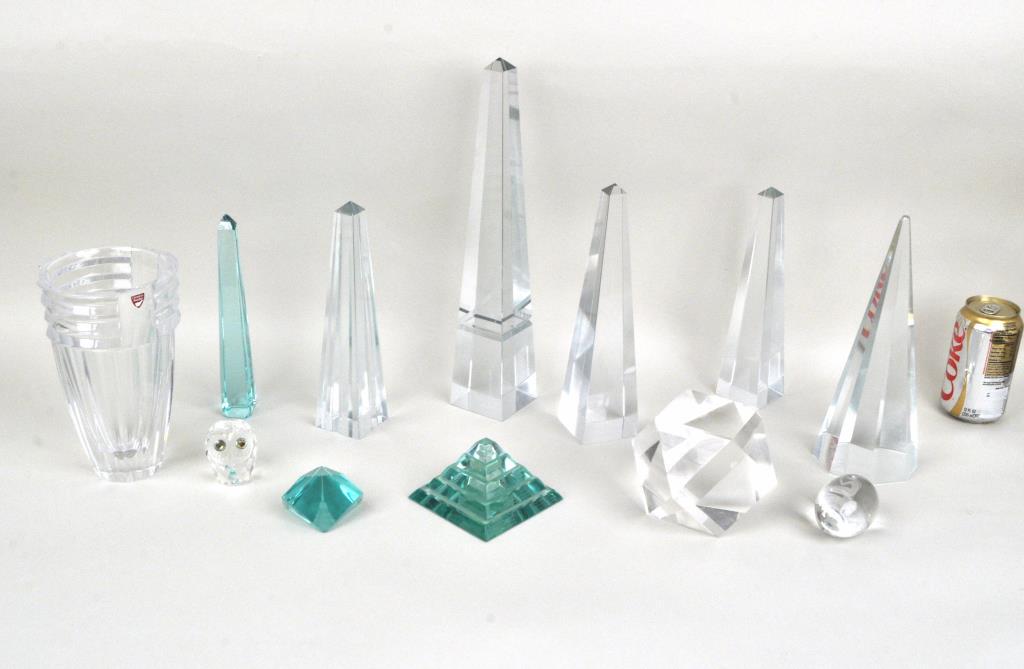 Collection Crystal Obelisks & Objects: including display objects and a large Orrefors vase, 12 items. The largest: 14 1/2" high, 2 1/2" wide, 2 1/2" deep. Small loss to crystal owl, several others with small chips. Property of a Southbury