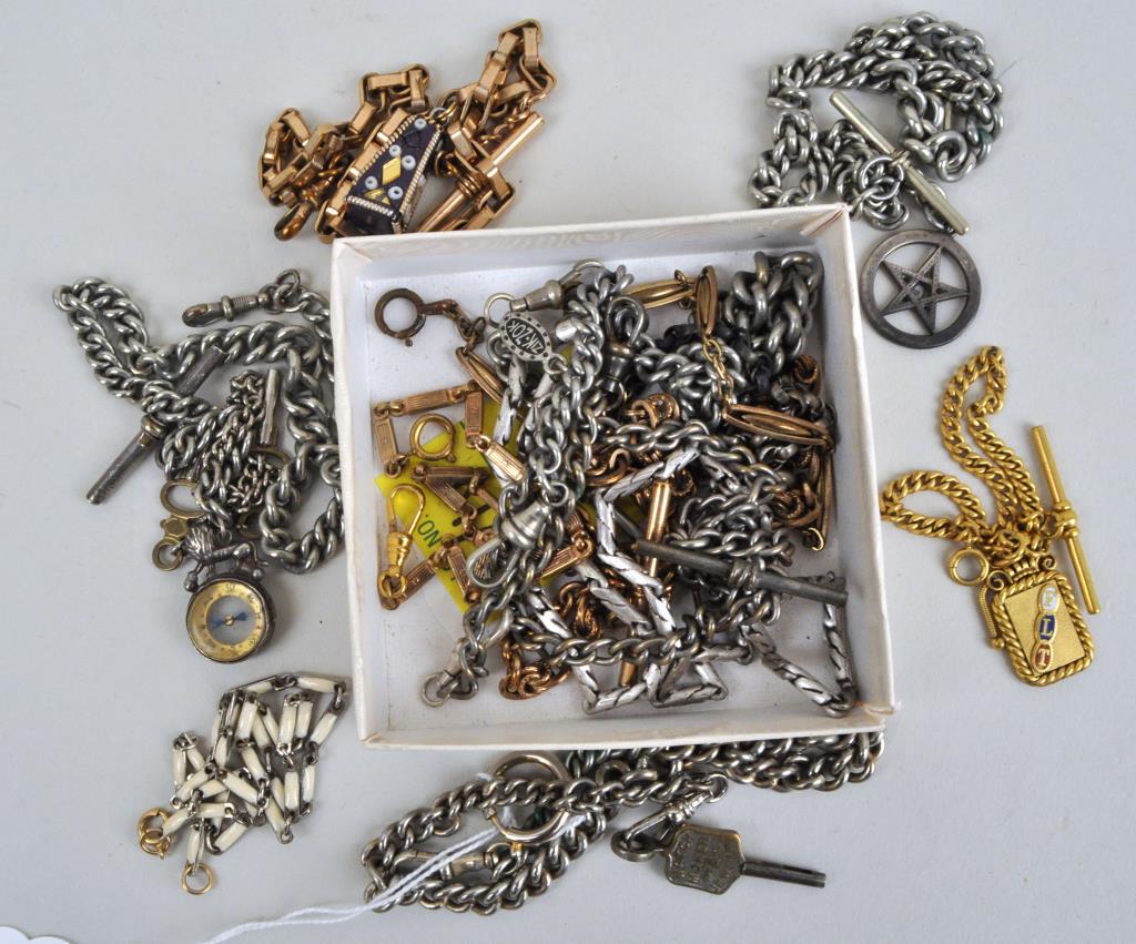 Group Thirteen Vintage Watch Fobs: one with lion compass and two keys, one with star, one monogrammed "FLT." One marked with watch maker and jeweler, "J. Jacoby 305 Hudson Str., Cor Spring, NY." Sizes range from 7 3/8" wide to 17" long