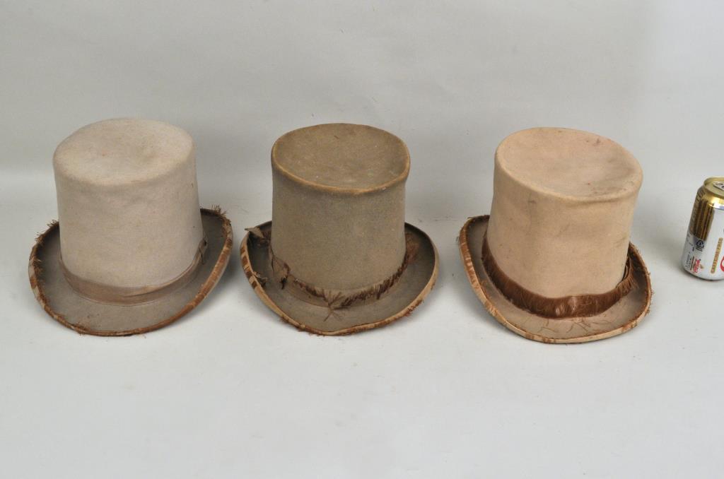 Group Three 19th C. Political Themed Top Hats: presidential parade hats, including examples for Benjamin Harrison and Grover Cleveland. The largest: 7" high, 10" wide, 11" deep. Estate condition as found, with wear and losses. Provenance: Property