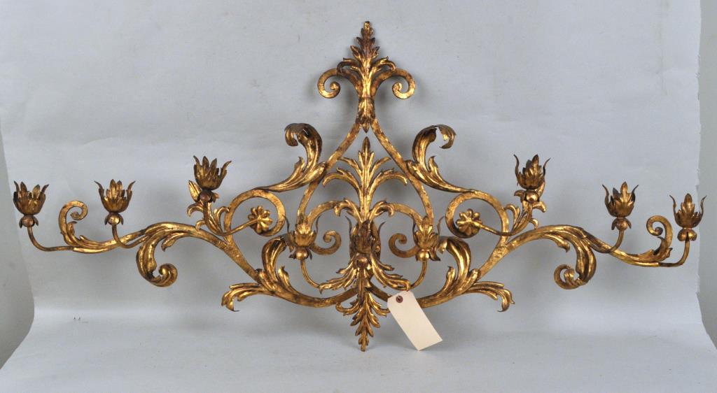 Gilt Metal 9-Light Wall Candelabra: 25" high, 60" wide, 7" deep. Gilt wear and oxidation. Provenance: Property of a Westchester County Collector.