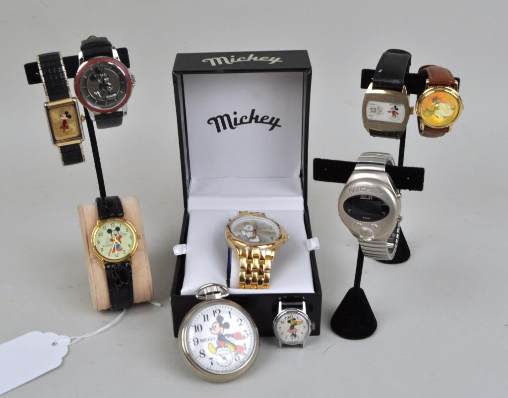 Group Mickey Mouse Watches: including a Bradley pocket and a vintage Minnie Mouse wristwatch. Watches are untested. Largest: 1 3/4" diameter. Provenance: Property of a Rockland County, NY Estate. We offer in-house packing and sh