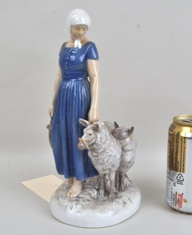 Bing & Grondahl Porcelain Shepherdess Figure: from the 1950's. 10 1/2" high, 5" diameter. We offer in-house packing and shipping of this item to an address in the United States for $45 via USPS Priority Mail. The price includes insurance up to $5