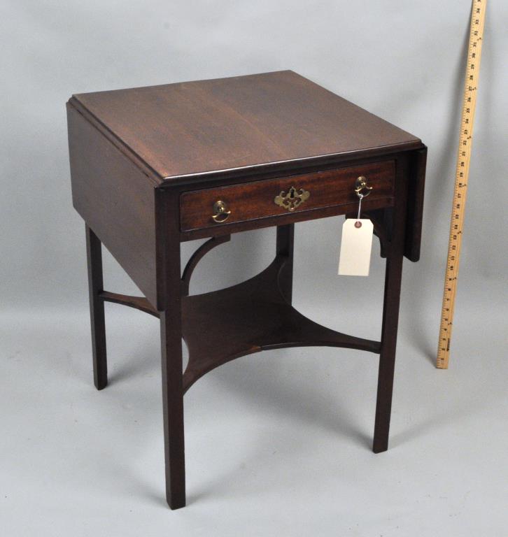 George III Mahogany Pembroke Table: with one drawer and connecting flat stretcher, 18th century. 28 1/2" high, 20" wide, 22" deep, 39 1/2" wide open. Scuffs to top.