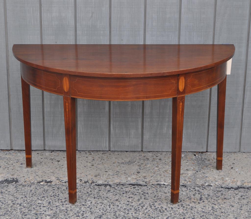 American Federal Inlaid Mahogany Console: with oval and carrot/icicle inlays, probably CT or Rhode Island, possible originally dining table end. 28 1/2" high, 48" wide, 24" deep. Age and use wear, right rear leg crooked.