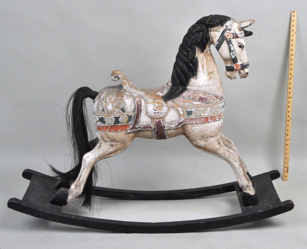 Carved & Polychromed Wood Carousel Horse: child's size, with later rockers. 39" high, 31" wide,14 1/2" deep. Head/neck cracked in several places, needs repair. Some loss of paint. In estate as found condition with age and use wear. Provenance