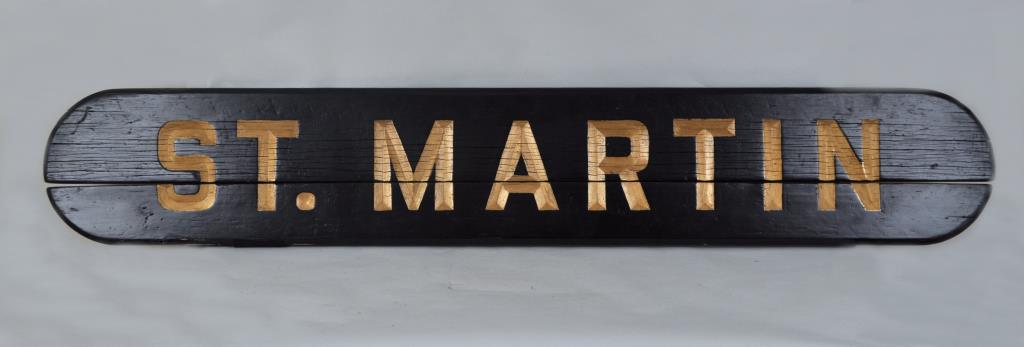 Ship Name Board From NY Tugboat "St. Martin": in carved and painted wood with gilt lettering. 11 3/4" high, 71 3/4" long. Wear from exposure to elements. Provenance: Estate of George E. Ratcliffe, Darien, CT.