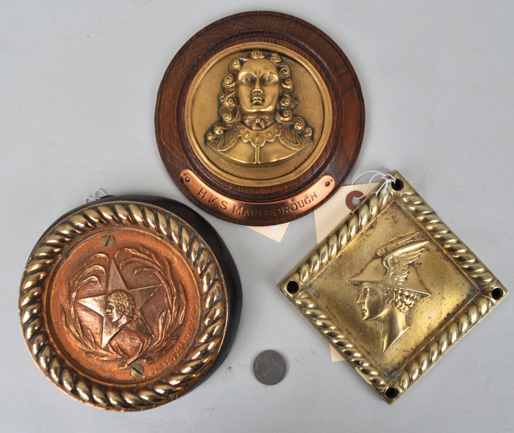Group of Bronze & Brass Ship's Badges: comprising "HMS Marlborough", "Corunna" and "Hermes". Largest: 6 1/8" diameter. Provenance: Estate of George E. Ratcliffe, Darien, CT. We offer in-house packing and shipping of this item to an address