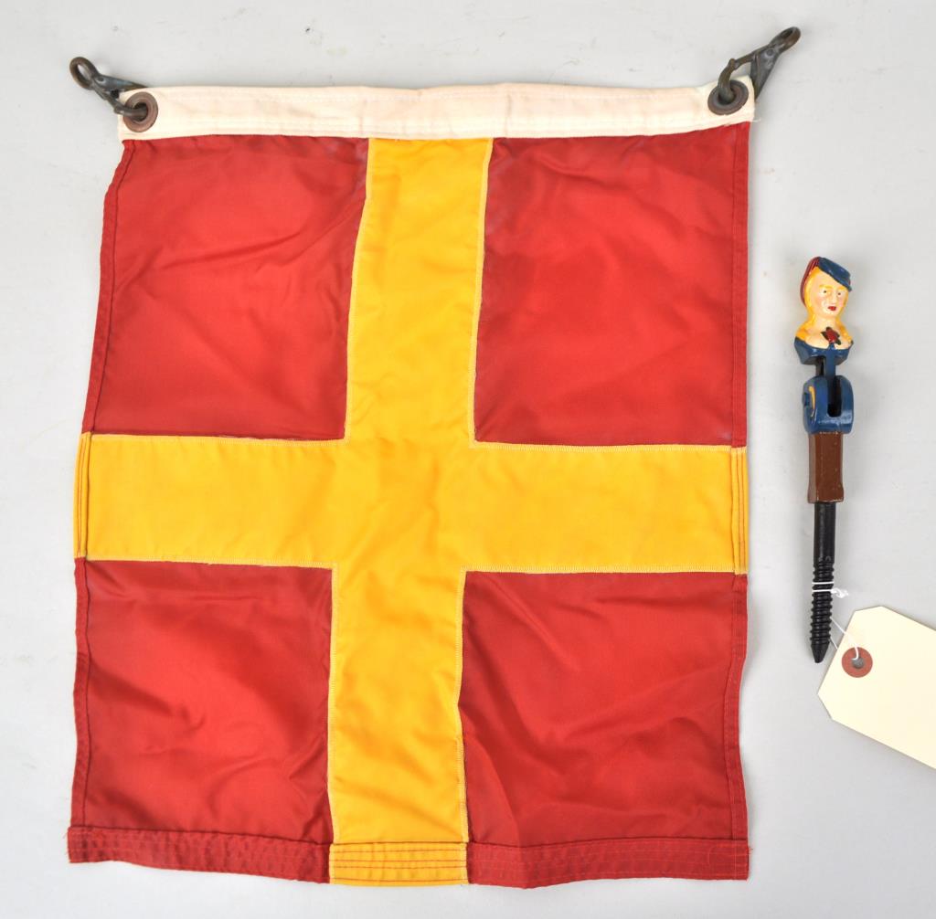 French Painted Swivel Figurehead Hook, Ship's Flag: hook impressed CF with anchor and "Brevete SCDC" Largest: 13" high, 15 1/2" wide. Use wear to flag. Provenance: Estate of George E. Ratcliffe, Darien, CT. We offer in-house packing and shipping of thi