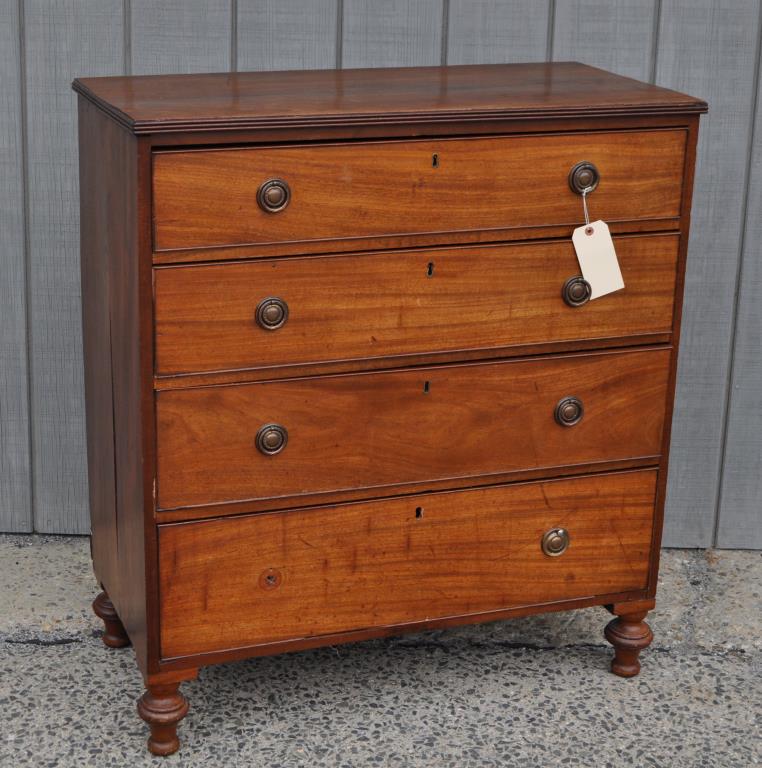 Late Regency Mahogany Four Drawer Chest: with reeded top edge, turned feet. 40 1/4" high, 36 1/4" long, 18 1/2" deep. Some wood losses and expected age and use wear, one foot loose on frame. Provenance: Property of a Fairfield County Collect