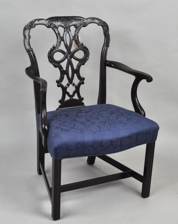 Chippendale Style Elaborately Carved Arm Chair: 38 7/8" high, 25" wide at the widest point, approximately 20" deep, seat height of 18 1/2". Very nice overall, has some finish wear to arms, crown has been re-attached. Some gouging to legs (mainly ba