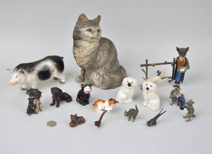 Group Fifteen Whimsical Small Animal Figures: comprising cat door stop, Vienna cold painted bronze cat and bird, three metal cats, two Royal Doulton cats, spelter cats, birds and dogs, Staffordshire dogs, and an Ernst Bohne & Sohne boar. Largest: