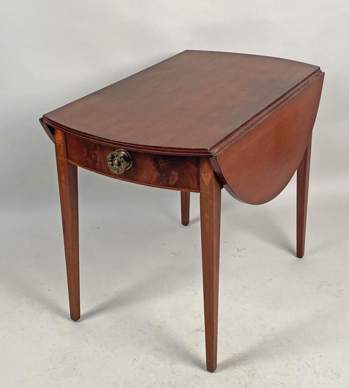 CT Inlaid Hepplewhite Mahogany Oval Pembroke Table: bellflower and diamond inlaid details. 26 1/4" high, 33 1/4" long, 22 1/2" wide (39 1/4" open). Age and use wear, finish wear, fading.