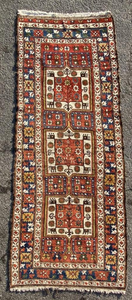 Baktiari Rug: 4' wide, 9' 2" long. Areas of low pile, trim wear/losses. All rugs sold as is.