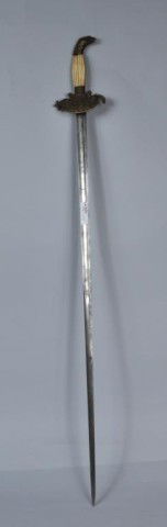 American Officer's Eagle Head Sword: American officer's sword, eagle head pommel with ribbed bone grip and cast brass counter guard with patriotic motifs, engraved blade, the ricasso marked S. & K., circa 1820-30. Lacking outer guard, no