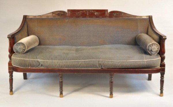 Sheraton McIntire Style Carved Mahogany Sofa: Sheraton style carved mahogany sofa, with cupid's bow crest with raised central panel, having floral and drapery carved relief panels, above a fluted border with rosette end blocks, with acanthus carv