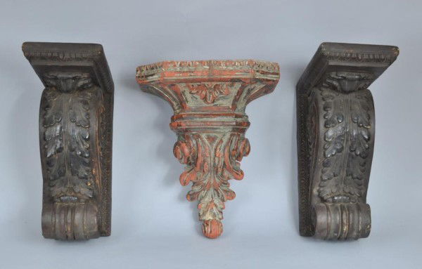 Three Antique Carved Brackets: A pair of carved corbel brackets, together with a polychrome foliate carved bracket, the pair 14" high, 6" wide, the single 14 1/4" high, 11 3/4" wide. From a Virginia collector.