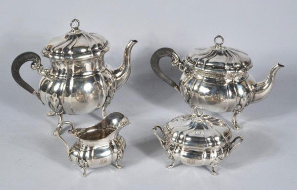 Four Piece Continental .800 Silver Tea Set: Continental .800 silver four piece tea set, with monogram, sugar bowl with interior pale gilt wash. Marked with weevil hallmark on sides (French) as well as possible maker's mark: an "L" - a Swan figu